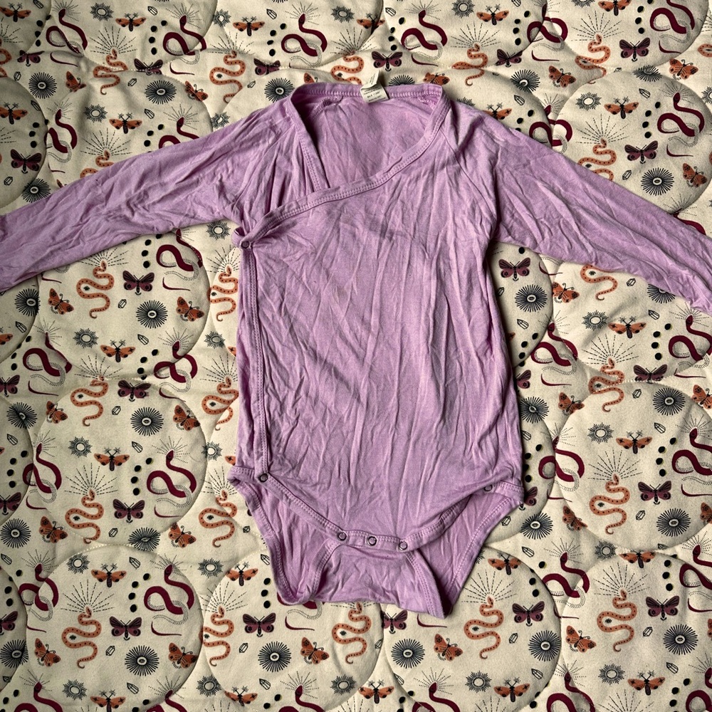 Kate Quinn wrap bodysuit